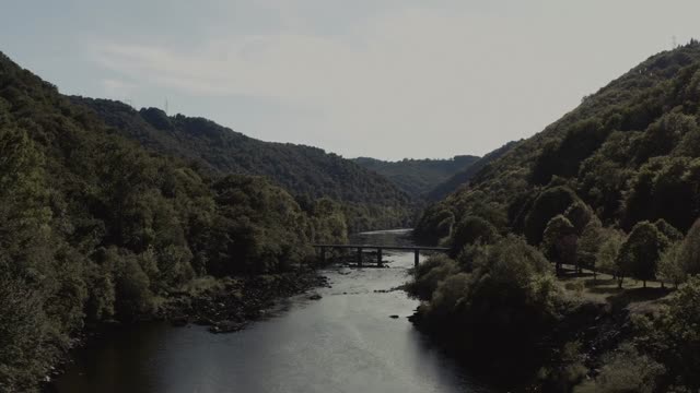 Stunning aerial footage of a serene river valley 