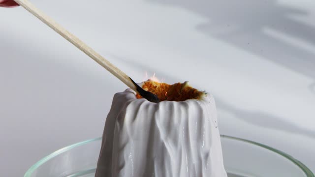 Watch a dramatic close-up of a chemical reaction in this science experiment.