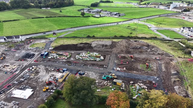 Drone footage capturing a construction site in the Irish countryside with scenic views.