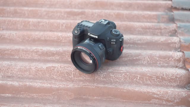 Detailed close-up shots of a DSLR camera showcasing lens, buttons, and design.