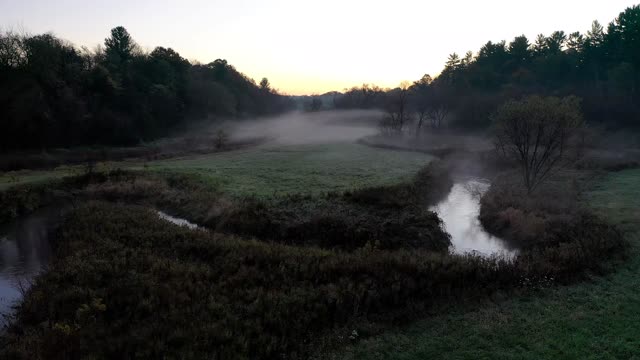 Sunrise over a serene river 